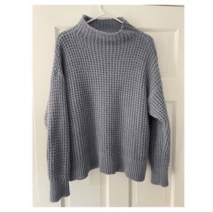 Light blue extremely soft quarter turtle neck sweater:)